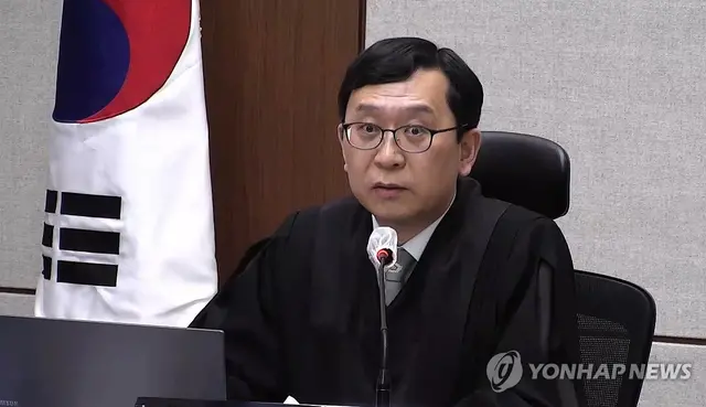 지난 1월 21일 서울중앙지법 형사33부에서 열린 한덕수 전 국무총리의 내란중요임무종사 혐의 1심 선고 공판에서 이진관 부장판사가 발언하고 있다.[서울중앙지법 제공·연합뉴스]