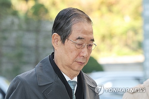 법정 향하는 한덕수 전 총리 [연합뉴스 자료사진]