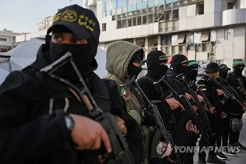 하마스 및 팔레스타인 이슬라믹 지하드 대원. [AP=연합뉴스 자료사진]